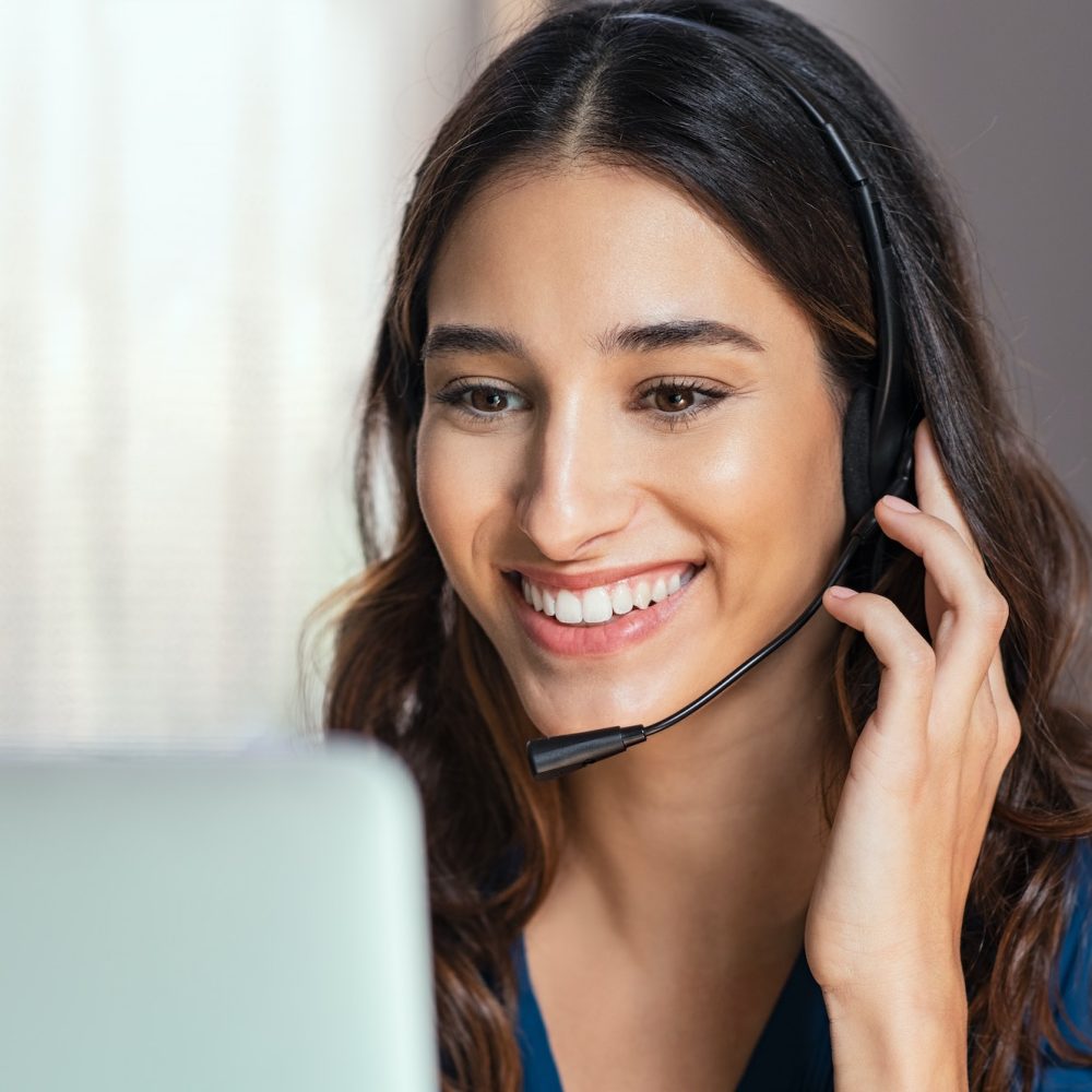 Call center operator with headphones